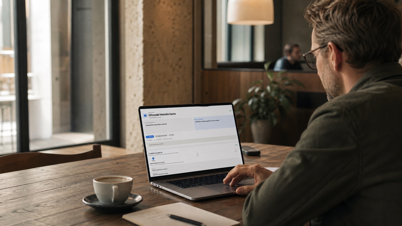 A professional using Offmodel on a Mac in a quiet café.